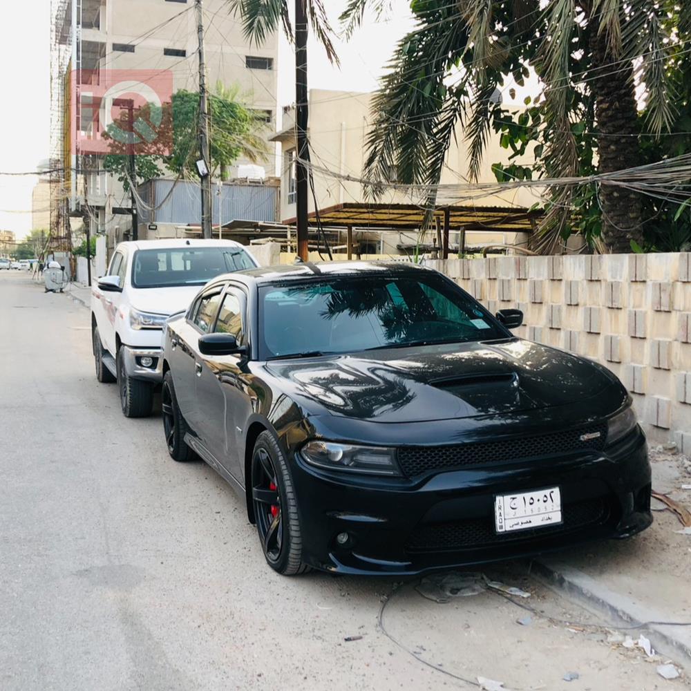 دۆج چارجەر